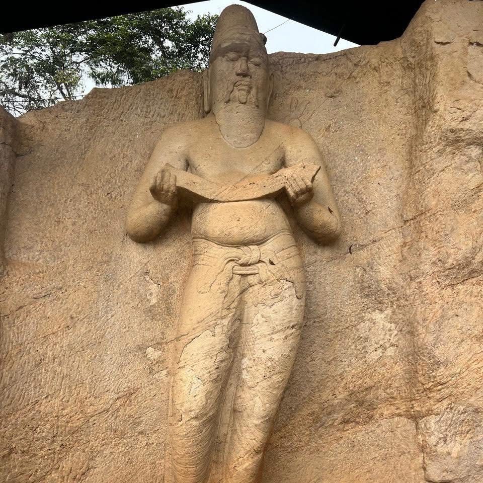 Ancient rock-cut statue of Sage Pulasti at Polonnaruwa, Sri Lanka